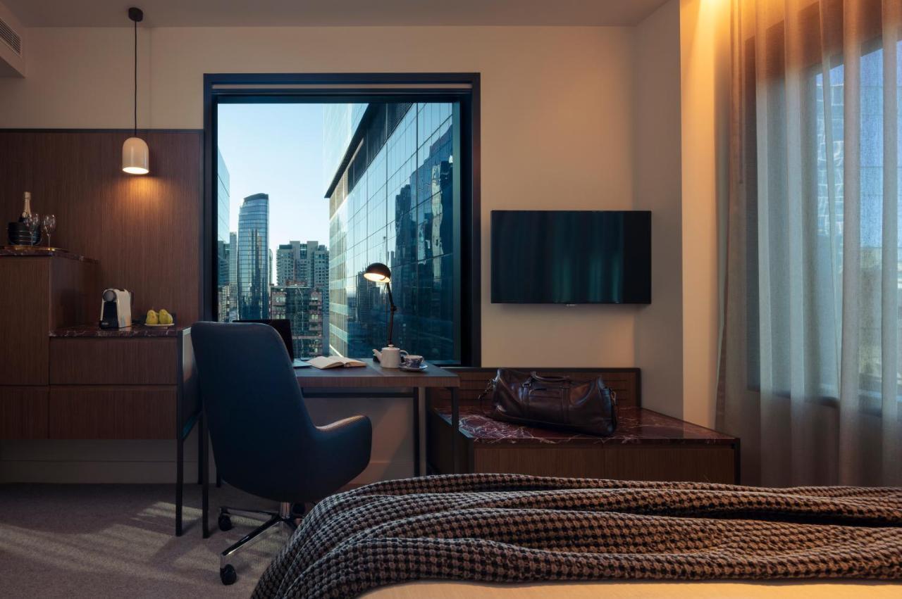 Next Hotel Melbourne, Curio Collection By Hilton Exterior foto A room at the hotel